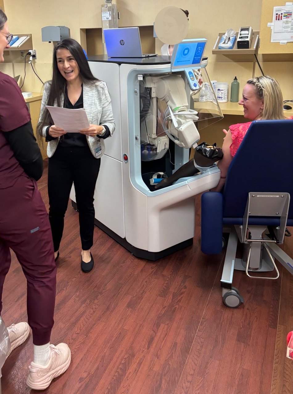 Clinical simulation session with facilitator, participant, and device interface